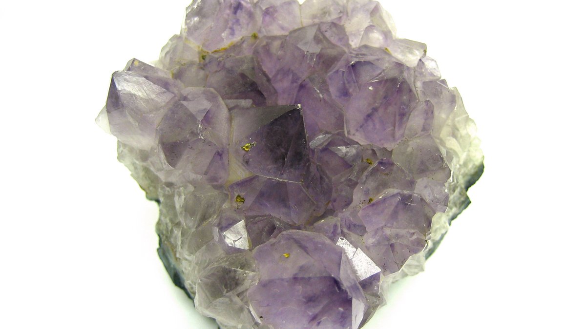 Cut amethyst gemstone showing deep violet colour and clarity